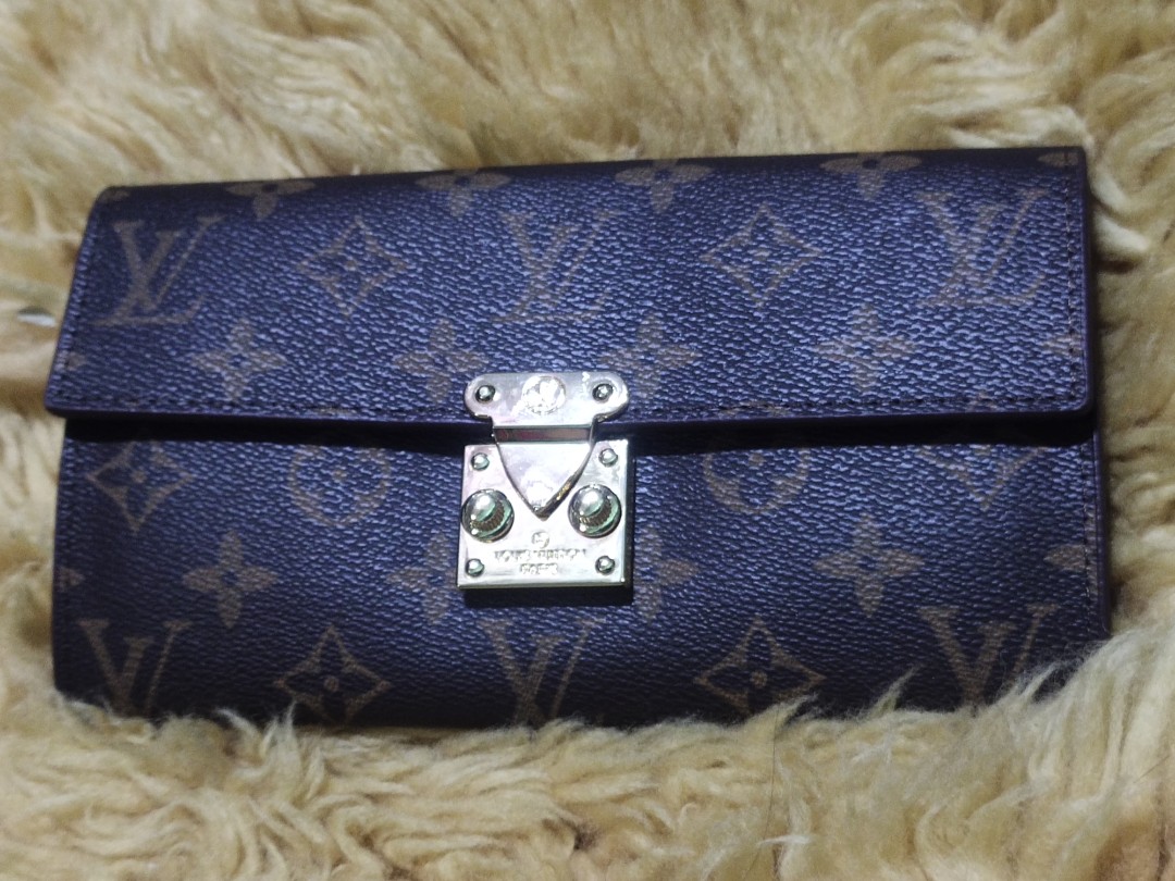 LV embossed metis wallet, Women's Fashion, Bags & Wallets, Wallets & Card  holders on Carousell