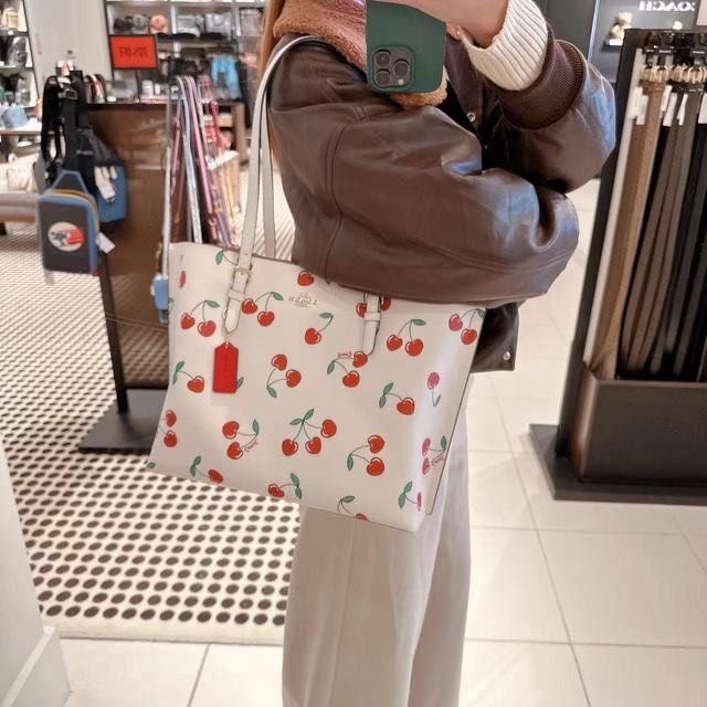 Coach cherry tote bag top