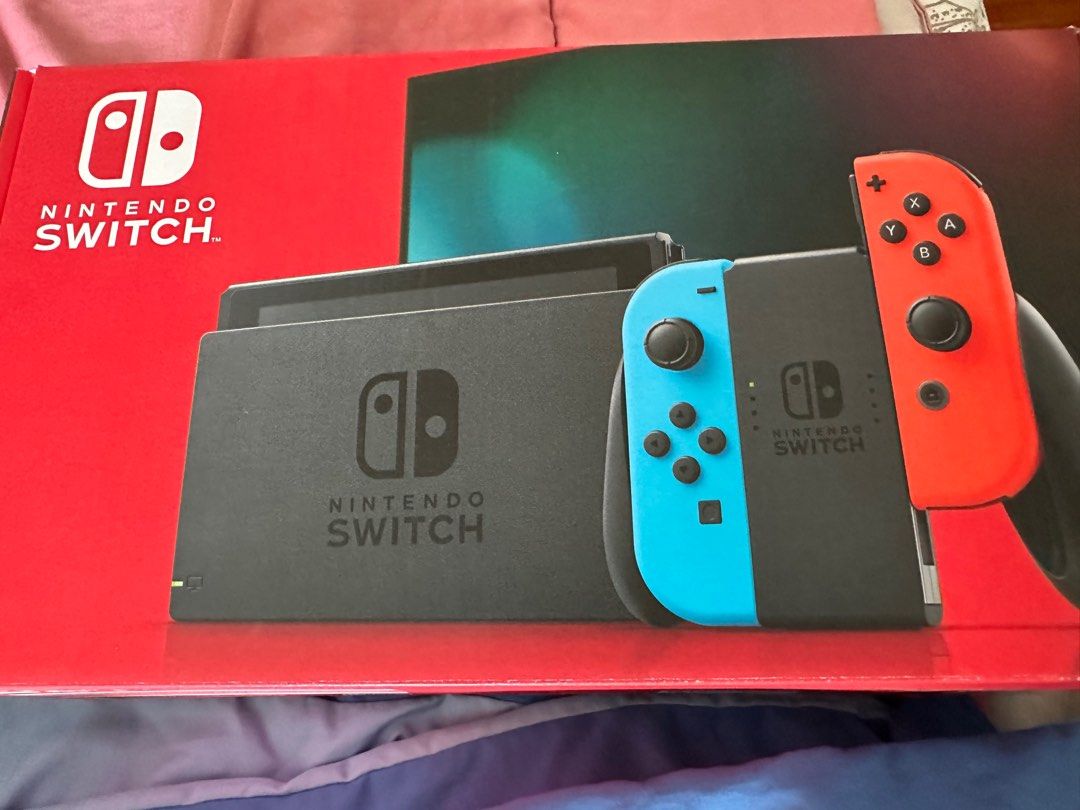 Nintendo switch console gen 2 neon with tempered glass and 128gb sd card included and one game63108479392003111