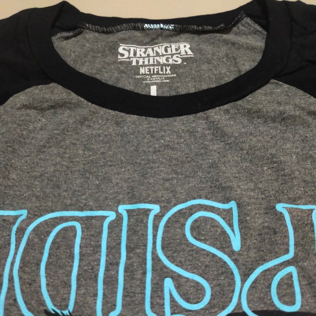 Stranger Things Shirt (Category: Tshirts & Polo Shirts ) located in San Fernando. Submitted by graileditemsph (Listing ID 1249534273, Image 3). Description: Stranger Things(Upside Down) Raglan Size large on Tag Fits XL 23/30.5 Excellent Condition.