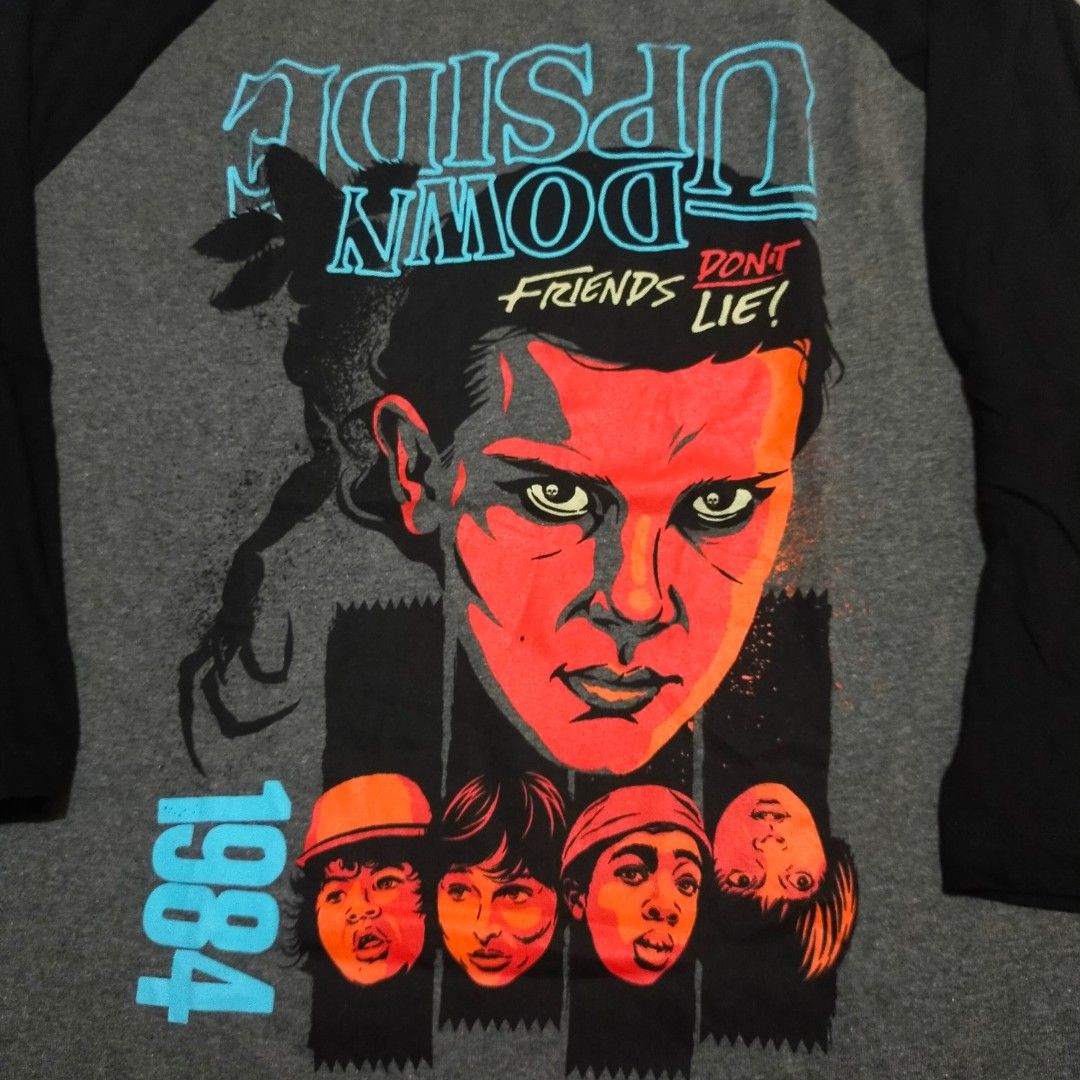 Stranger Things Shirt (Category: Tshirts & Polo Shirts ) located in San Fernando. Submitted by graileditemsph (Listing ID 1249534273, Image 2). Description: Stranger Things(Upside Down) Raglan Size large on Tag Fits XL 23/30.5 Excellent Condition.