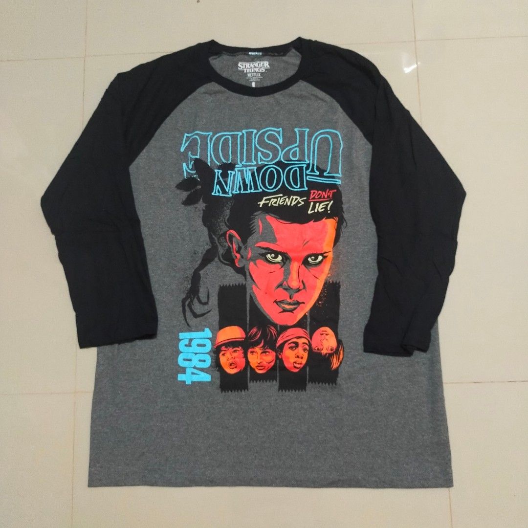 Stranger Things Shirt (Category: Tshirts & Polo Shirts ) located in San Fernando. Submitted by graileditemsph (Listing ID 1249534273, Image 1). Description: Stranger Things(Upside Down) Raglan Size large on Tag Fits XL 23/30.5 Excellent Condition.