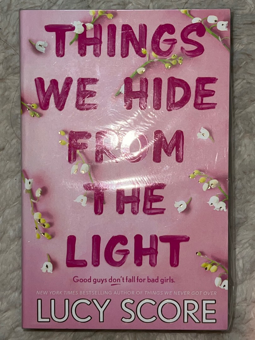 Things We Hide from the Light (lucy score), Hobbies & Toys, Books &  Magazines, Storybooks on Carousell