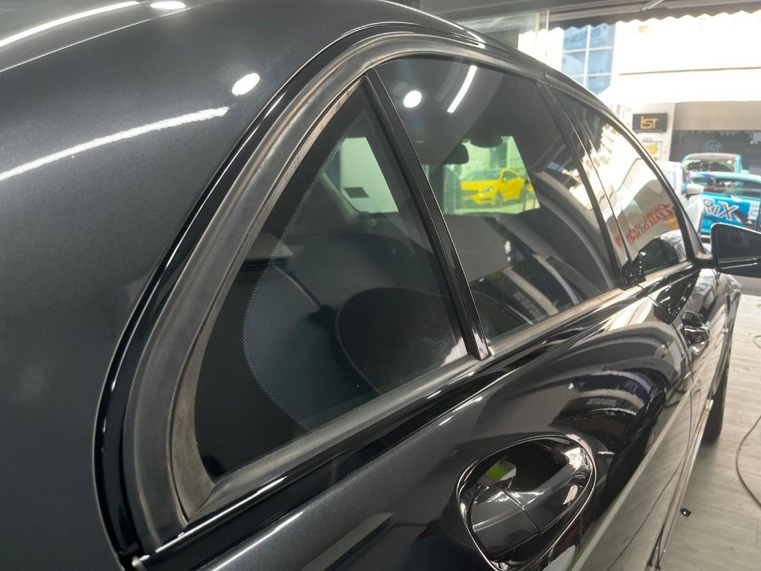 Dechrome store window trim