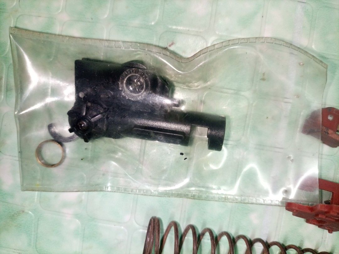 Airsoft parts (Category: Action & Battle Toys) located in Manila. Submitted by abumusamus (Listing ID 1249657944, Image 2). Description: 2 pcs. Trigger switch Yung Isa Bago Yung Isa slight use, spring di ko matandaan Yung Isa ano fps Yung Isa stock spring ng JGmp5, hop up chamber/ rubber/ piston ng JGMp5 600 na lang lahat bawas Kalat Sta Mesa Manila call or pm salamat.