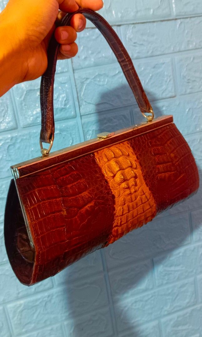 Crocodile skin bag (Category: Purses & Pouches) located in Bayambang. Submitted by jnmrk (Listing ID 1249639014, Image 1). Description: authentic crocodile bag for women good condition japan made loc manila 1500 nalang siya.
