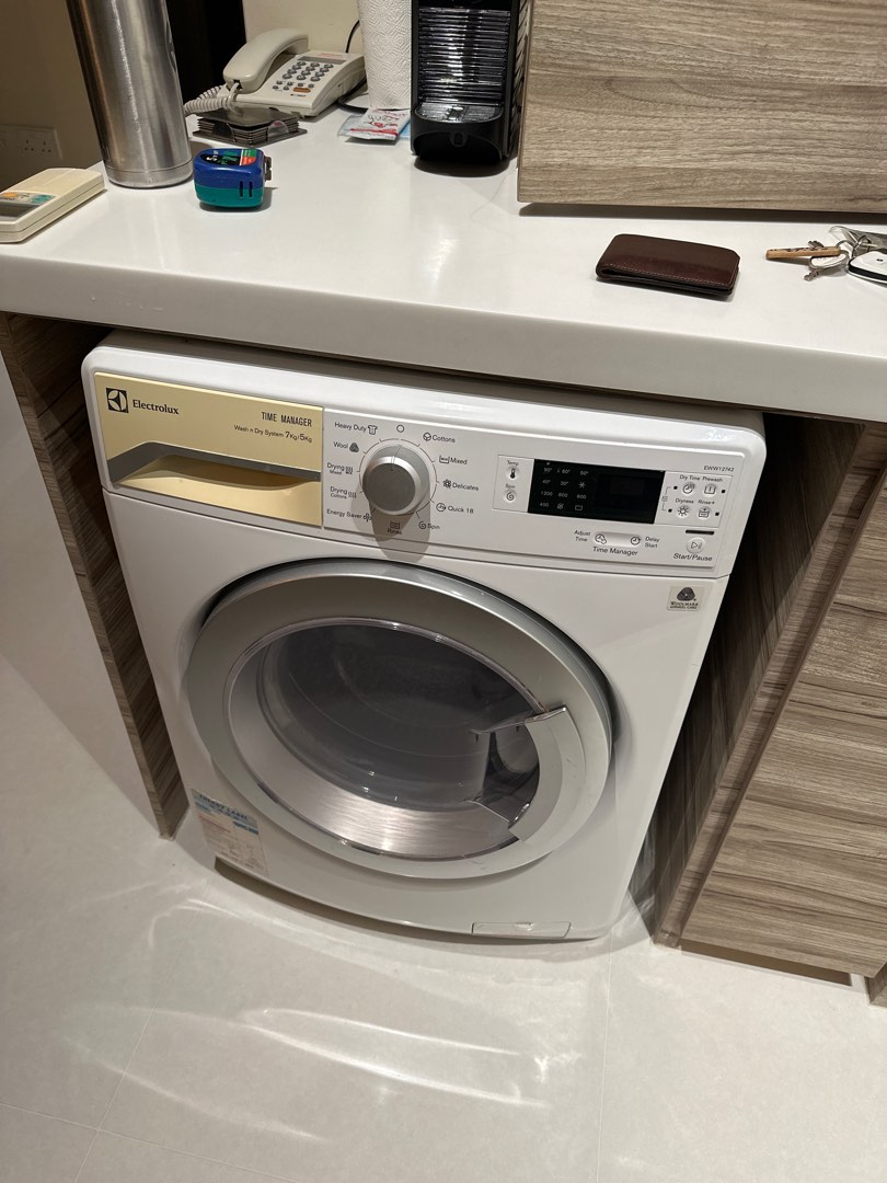 Electrolux washer cum dryer (2 in 1) combined appliance, TV & Home
