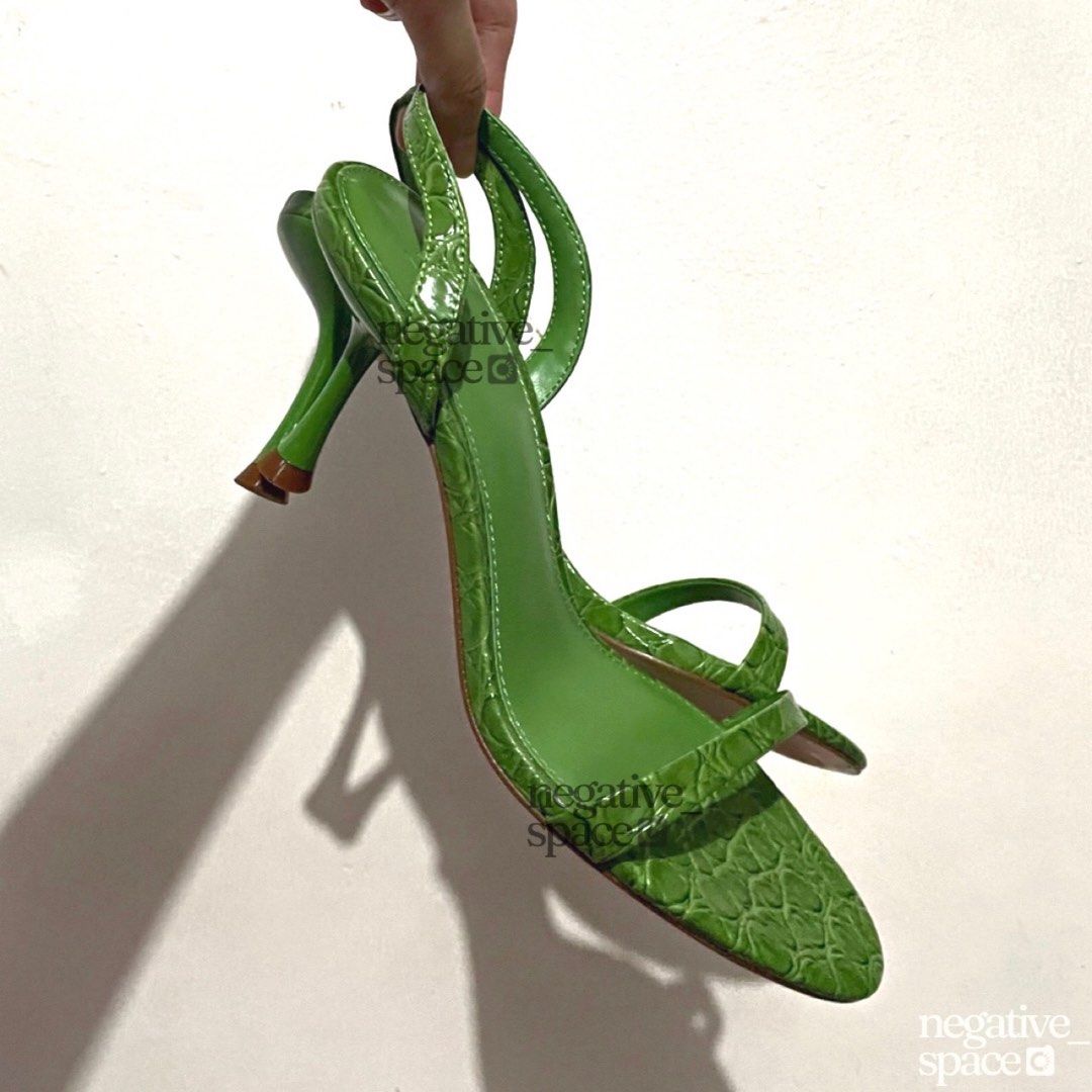 Mango Croc Effect Trumpet Heels in Green (Category: Heels) located in Quezon City. Submitted by negative_space (Listing ID 1249746739, Image 1). Description: Size EU 38. Bought from Zalora PH for P2495 and it's out of stock now. Love this design but i used it only once because it's loose on my Size 7 (US) feet. I recommend it for size 7 1/2 or 8 instead. Heel height is 5 cm. Will come with the original box. Can clean the bottoms a bit before ship