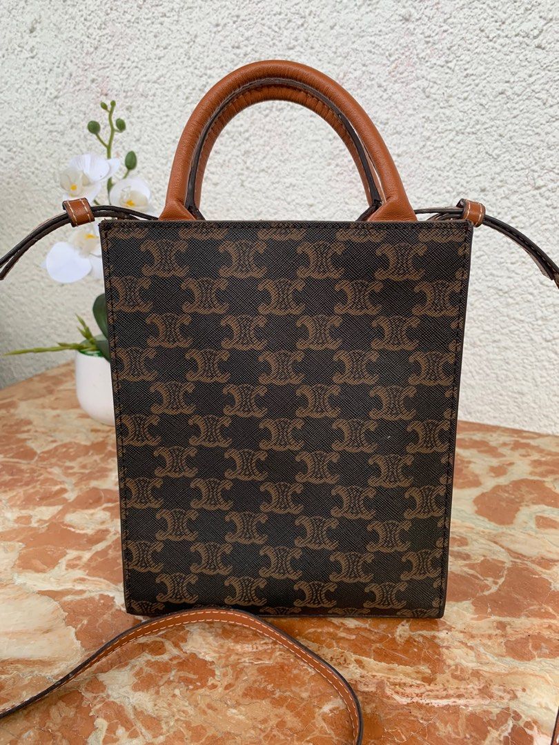 Lisa celine mini vertical cabas store in triomphe canvas