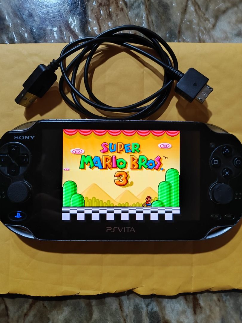 Modded PS Vita 64 GB upgraded storage options. NES, SNES, GBA, MEGA