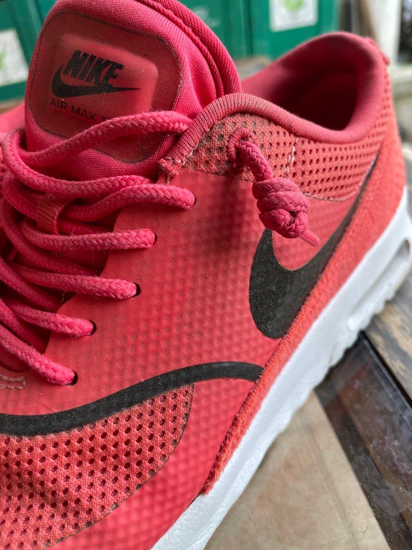 Nike online thea size