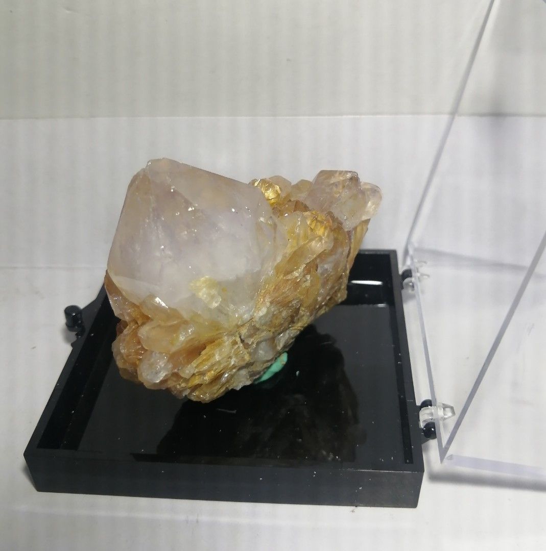 Gold Calcite with White Calcite Point Specimen (Category: Precious Stones) located in Quezon City. Submitted by marnancuacor (Listing ID 1249757096, Image 2). Description: 🌻 Benefits : GOLD CALCITE Meaning and Spiritual Healing Properties: Calcite is a common mineral found around the world. While dull yellow Calcite is common, transparent vivid Gold Calcite is rare. Some fantastic specimens have been found in the United States, particularly in F