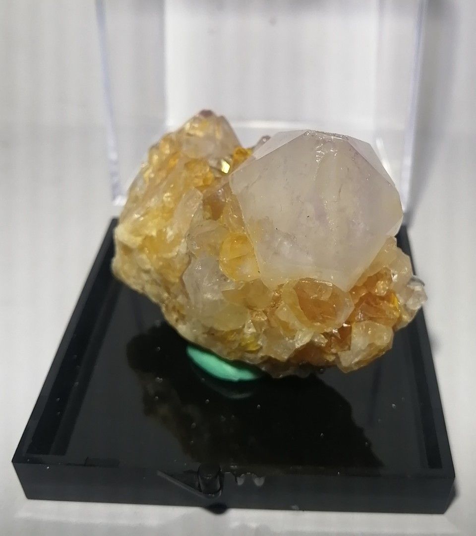Gold Calcite with White Calcite Point Specimen (Category: Precious Stones) located in Quezon City. Submitted by marnancuacor (Listing ID 1249757096, Image 1). Description: 🌻 Benefits : GOLD CALCITE Meaning and Spiritual Healing Properties: Calcite is a common mineral found around the world. While dull yellow Calcite is common, transparent vivid Gold Calcite is rare. Some fantastic specimens have been found in the United States, particularly in F