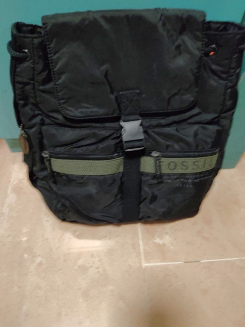 Backpack (Category: Backpacks) located in Singapore. Submitted by hentph803 (Listing ID 1249958770, Image 3). Description: Zip & strap are in good condition, no scratches or any flaws including shape of bag. Not to forget plus a laptop compartment. (Free jockey cap upon purchase).