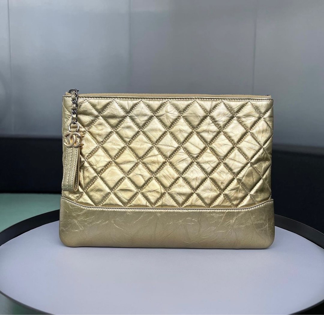 Chanel Gabrielle O Case Clutch Medium Calfskin Metallic gold / Ghw