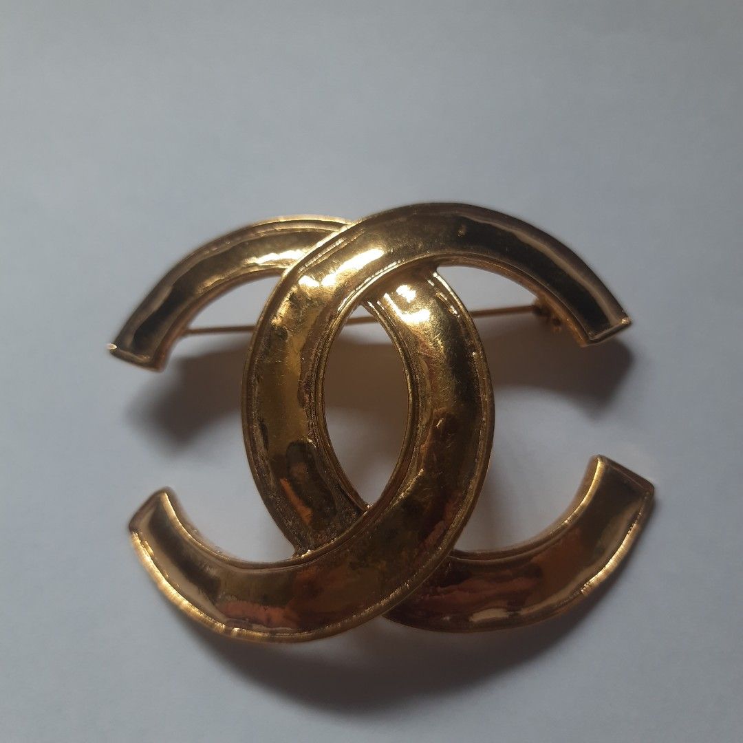 Chanel brooch cost deals