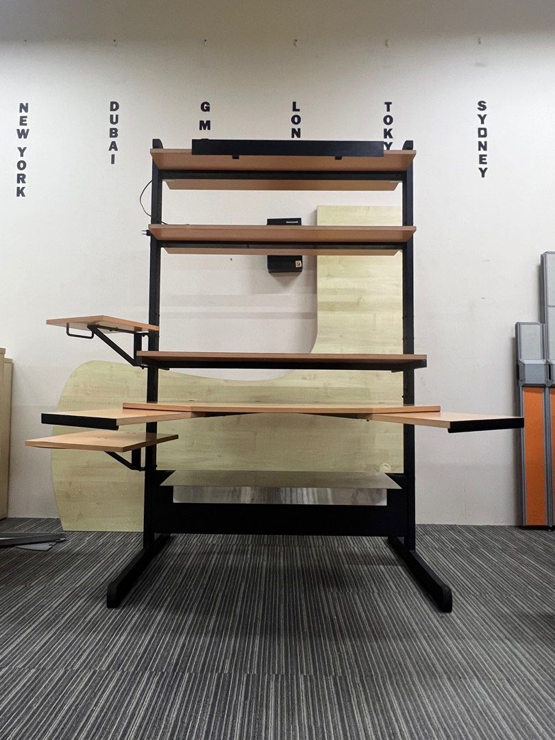 Computer Table (Category: Tables & Sets) located in Singapore. Submitted by luckylama (Listing ID 1249985945, Image 2). Description: This computer / study table comes with extra space from the extended arms and shelves. Has overhead light. Has many shelves including a cable tray at the bottom of the table. Served me well but i need a smaller table now after shifting. Thus selling. Delivery and set up can be arranged for a fee depending on locatio
