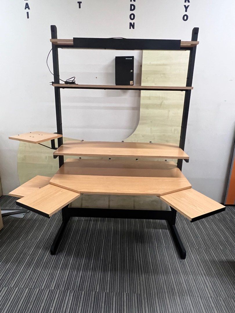 Computer Table (Category: Tables & Sets) located in Singapore. Submitted by luckylama (Listing ID 1249985945, Image 1). Description: This computer / study table comes with extra space from the extended arms and shelves. Has overhead light. Has many shelves including a cable tray at the bottom of the table. Served me well but i need a smaller table now after shifting. Thus selling. Delivery and set up can be arranged for a fee depending on locatio