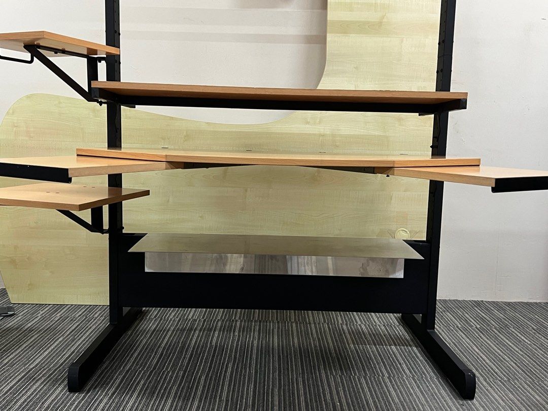 Computer Table (Category: Tables & Sets) located in Singapore. Submitted by luckylama (Listing ID 1249985945, Image 3). Description: This computer / study table comes with extra space from the extended arms and shelves. Has overhead light. Has many shelves including a cable tray at the bottom of the table. Served me well but i need a smaller table now after shifting. Thus selling. Delivery and set up can be arranged for a fee depending on locatio