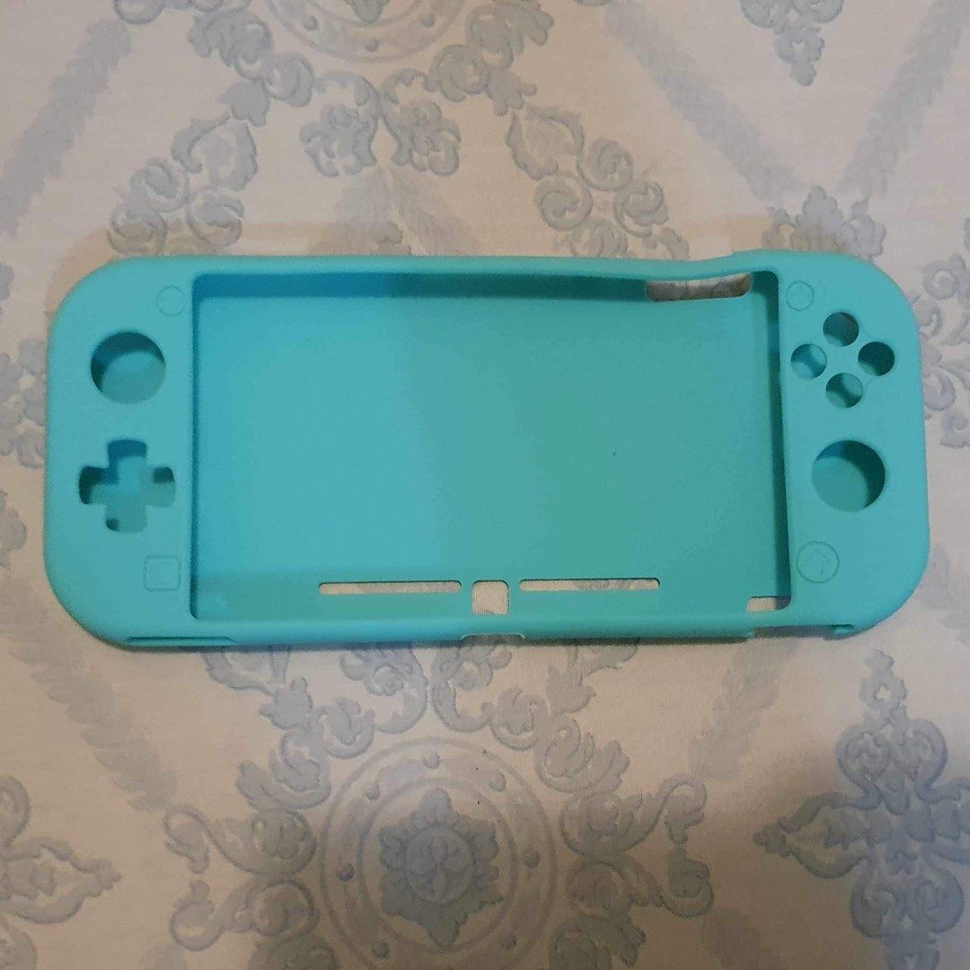 Green Nintendo Switch Lite Protective Cover (Category: Cases & Covers) located in Quezon City. Submitted by zoelyssa (Listing ID 1249810700, Image 1). Description: .