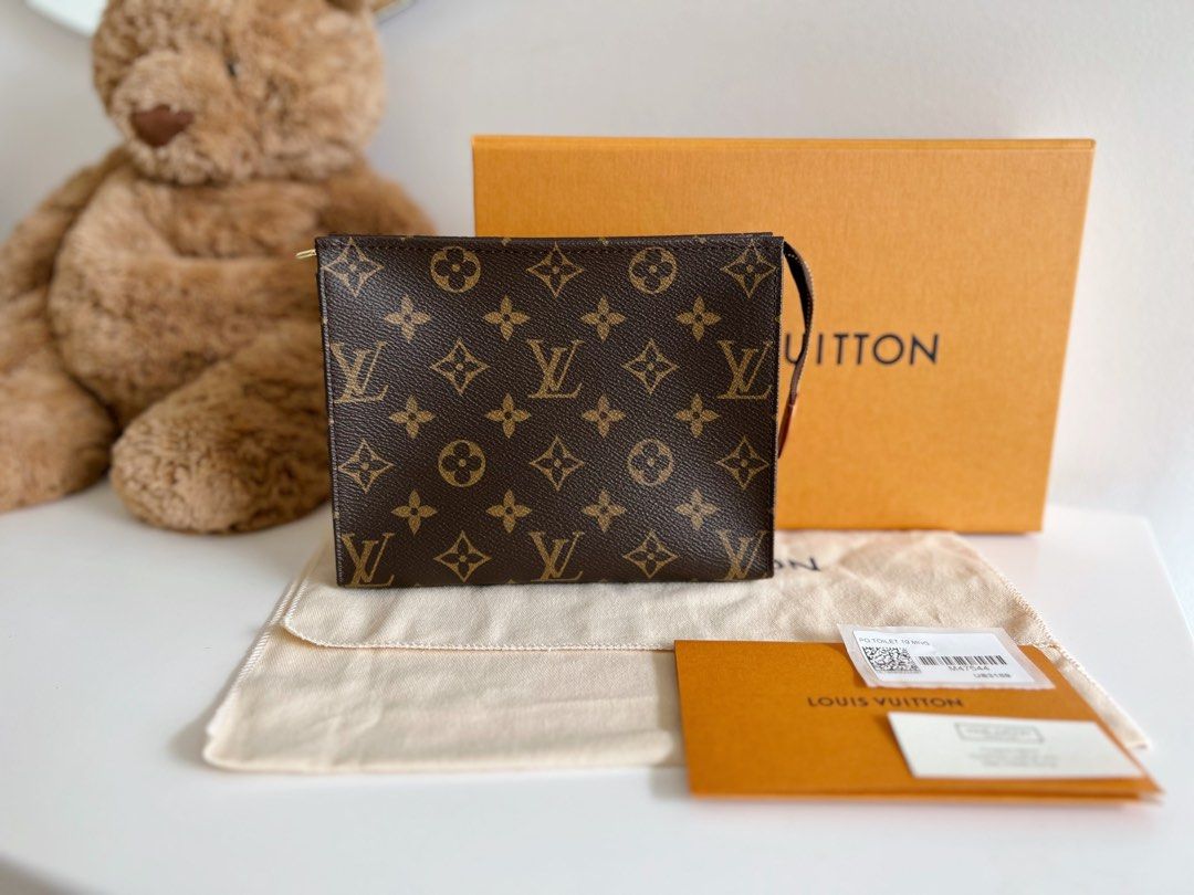 LV TOILETRY 19 WITH CHAIN, Women's Fashion, Bags & Wallets, Cross-body Bags  on Carousell