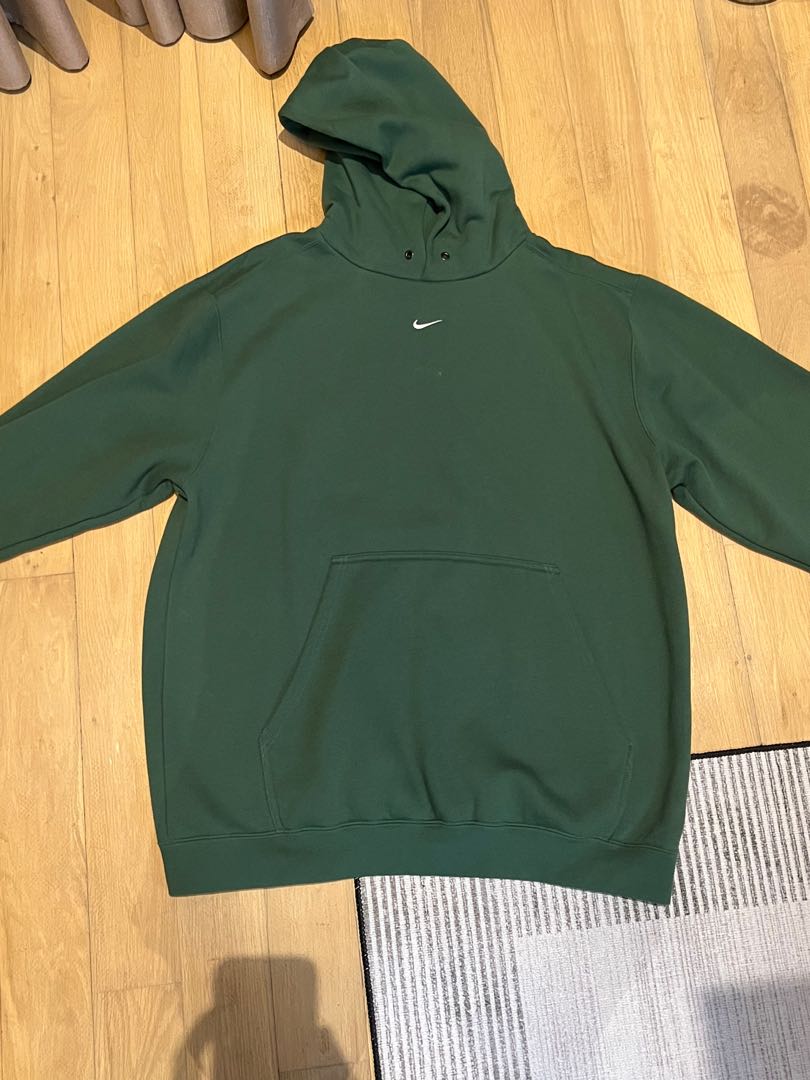 Nike green hoodie with swoosh in the middle Men s Fashion Coats
