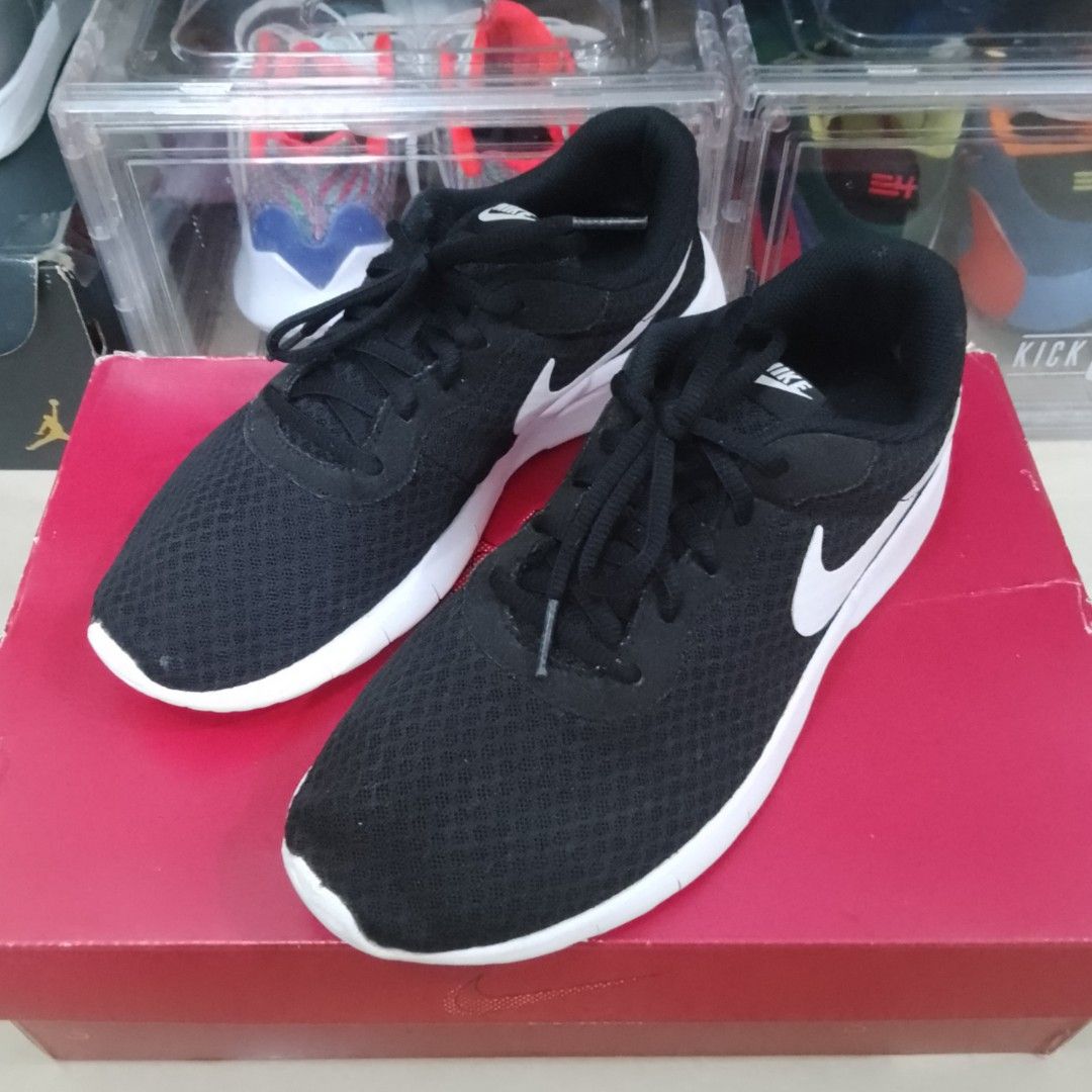Nike tanjun size sales 7