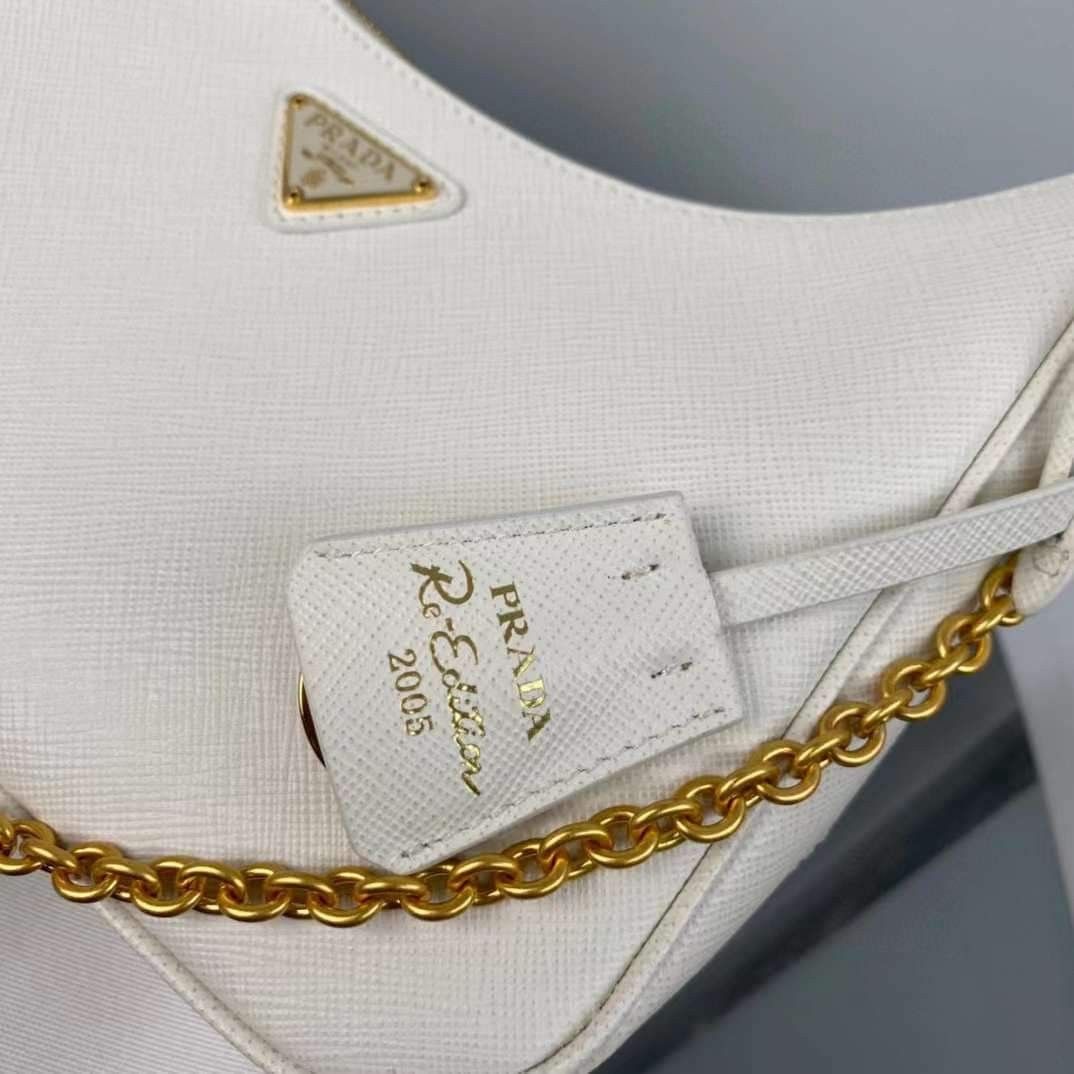 Sold at Auction: Prada - Odette Saffiano Leather Silver Belt Bag