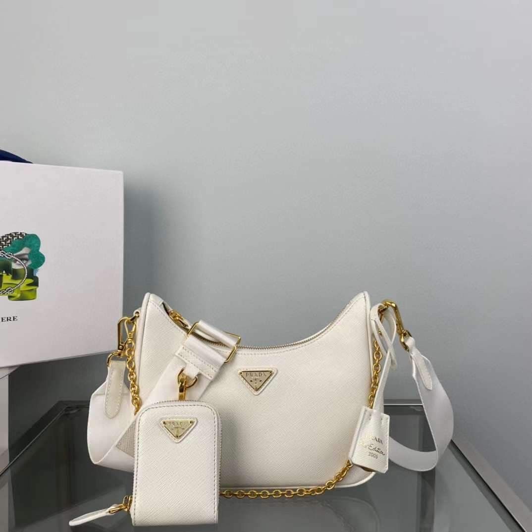 At Auction: Prada - Odette Saffiano Leather Silver Belt Bag/Crossbody