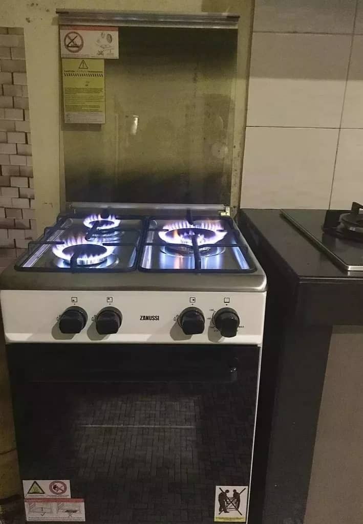 Zanussi 3 Gas Burner Freestanding Gas Cooker with 62L Gas Oven Cooker (Category: Cookware & Accessories) located in Pasir Puteh. Submitted by megat_82 (Listing ID 1249940621, Image 3). Description: Zanussi 3 Gas Burner Freestanding Gas Cooker with 62L Gas Oven Cooker | ZCG530W (Dapur Gas,Ketuhar Gas) FEATURES ・3 Gas Burner ・62L Gas Oven ・One Step Piezo Ignition ・Matte Enamel Finished Pan Support ・Blue Flame Technology ・Tempered Glass Lid ・Double-