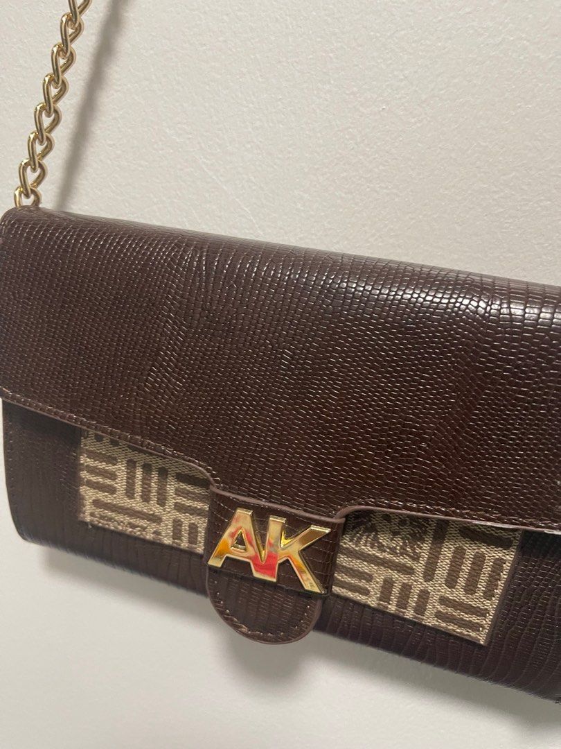 Anne Klein Chocolate Wallet on Chain Bag (Category: Luxury Bags & Wallets) located in Quezon City. Submitted by sophsnowbentables (Listing ID 1246626856, Image 2). Description: Gifted from a relative! Rfs: not my style Can give a 100 pesos discount for paying asap.