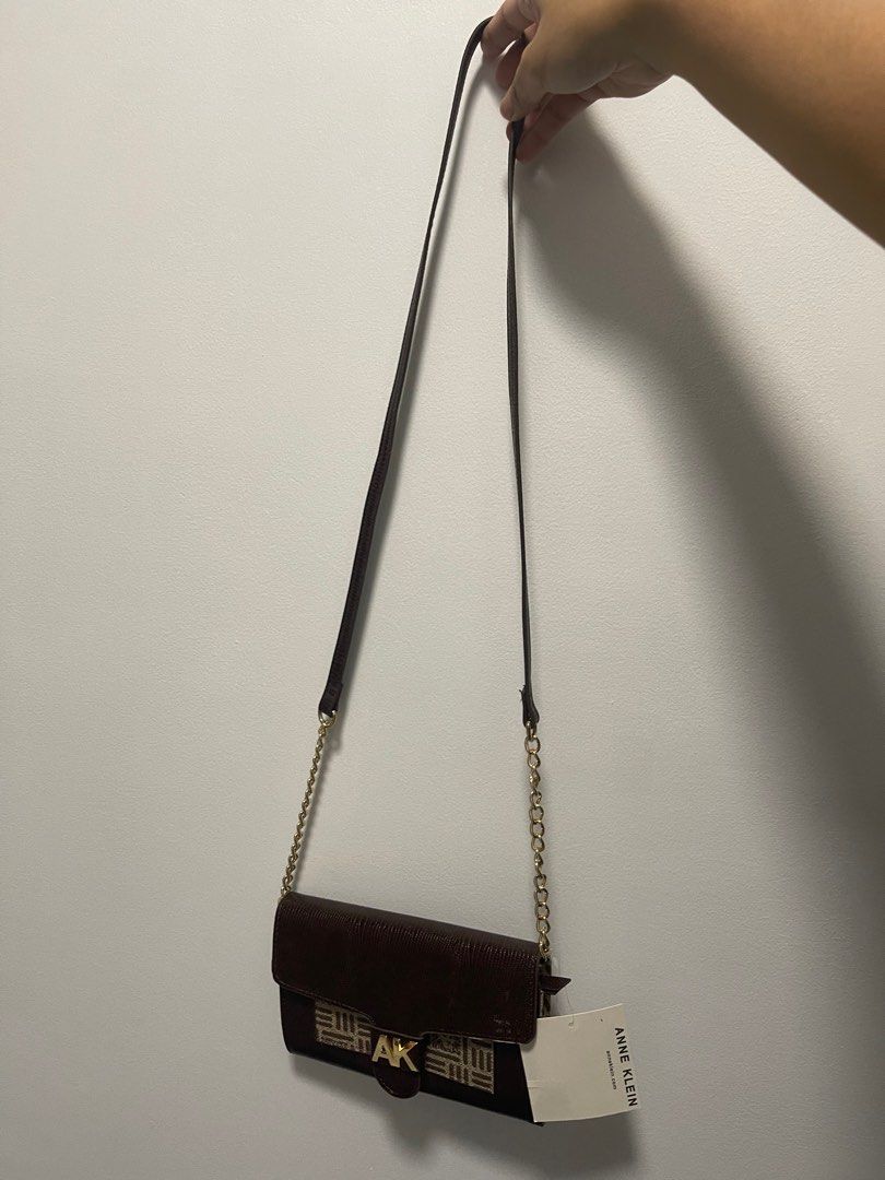 Anne Klein Chocolate Wallet on Chain Bag (Category: Luxury Bags & Wallets) located in Quezon City. Submitted by sophsnowbentables (Listing ID 1246626856, Image 3). Description: Gifted from a relative! Rfs: not my style Can give a 100 pesos discount for paying asap.