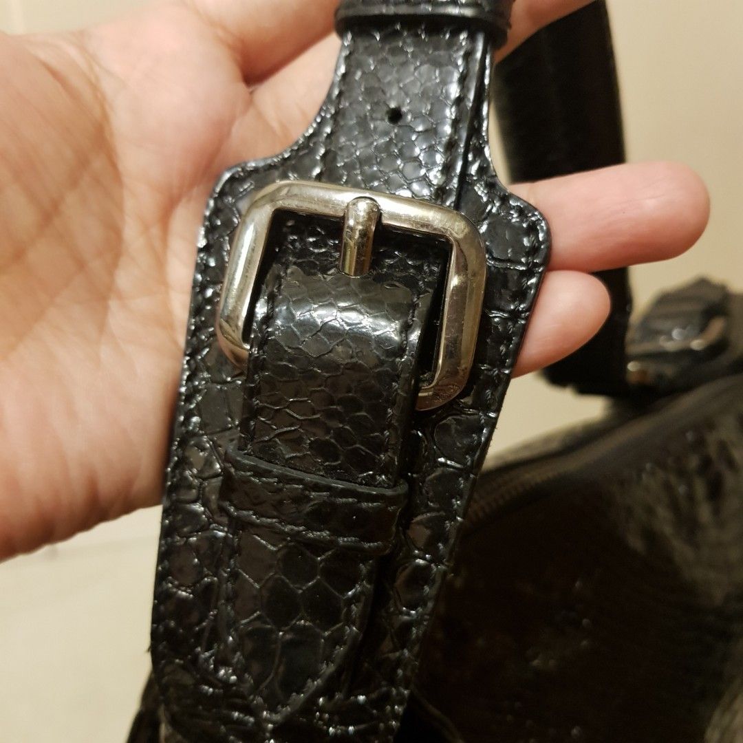 Authentic Bags (Category: Luxury Bags & Wallets) located in Manila. Submitted by geecollection01 (Listing ID 1246567151, Image 2). Description: BEAUTIFUL Laurel bag in black python patent leather. Black Zip fastening. Interior pocket with zipper and pockets for objects. Condition: Very good condition Measurement: Width: 17.3 in Height: 11.8 in Depth: 7.1 in.