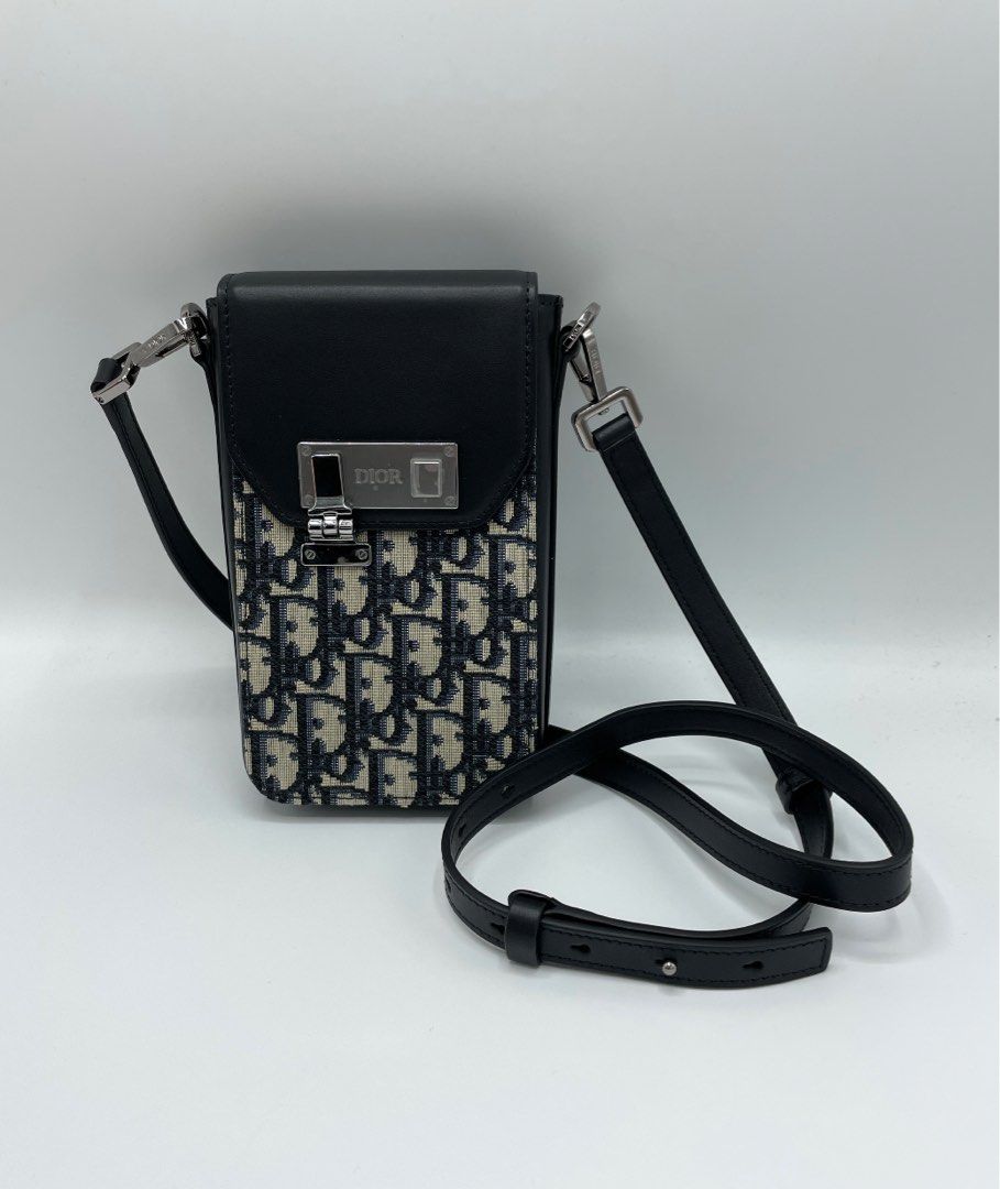 Authentic Dior Oblique Jacquard Vertical Lock Pouch with Strap, Luxury, Bags  & Wallets on Carousell