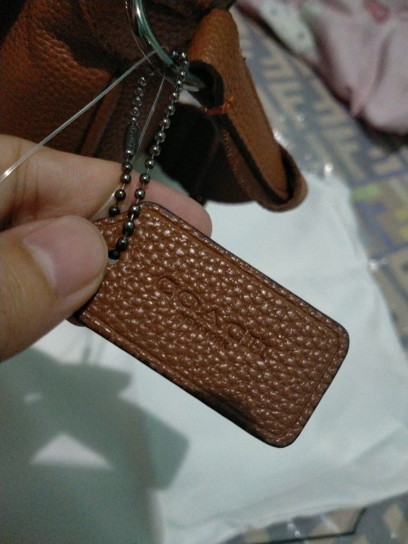Authentic Vietnam Coach (Category: Sling Bags) located in Pasay City. Submitted by maljake (Listing ID 1246536876, Image 3). Description: °Classy and Smooth leather °with dust bag °receipt.