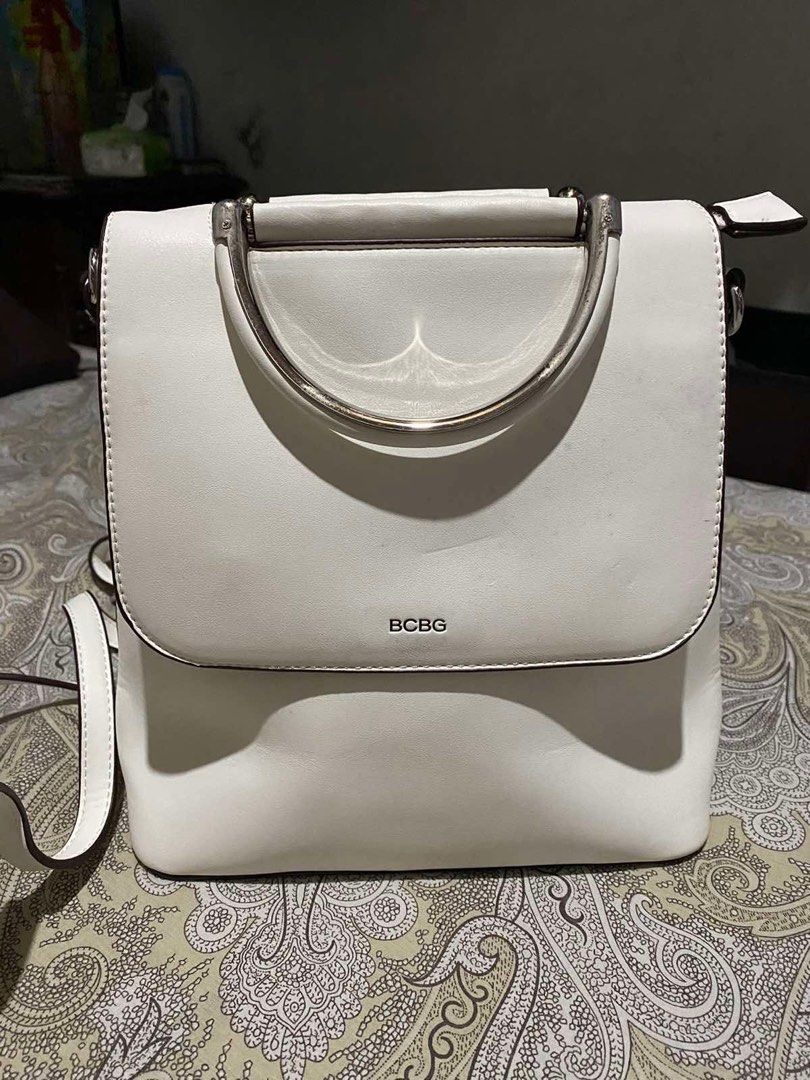 BCBG Maxazria Backpack (Category: Backpacks) located in Pasay City. Submitted by keepitluxe (Listing ID 1246721835, Image 1). Description: Ivory white with silver hardware, adjustable and convertible straps from backpack to shoulder bag. Magnetic and zipper closure. No stains in interior lining, Very good condition From US ⚠️Strictly NO CANCELLATION of order. ⚠️ No rush orders/ shipping ⚠️ Shipping fee will be shouldered by the buyer. ⚠️ Payment 