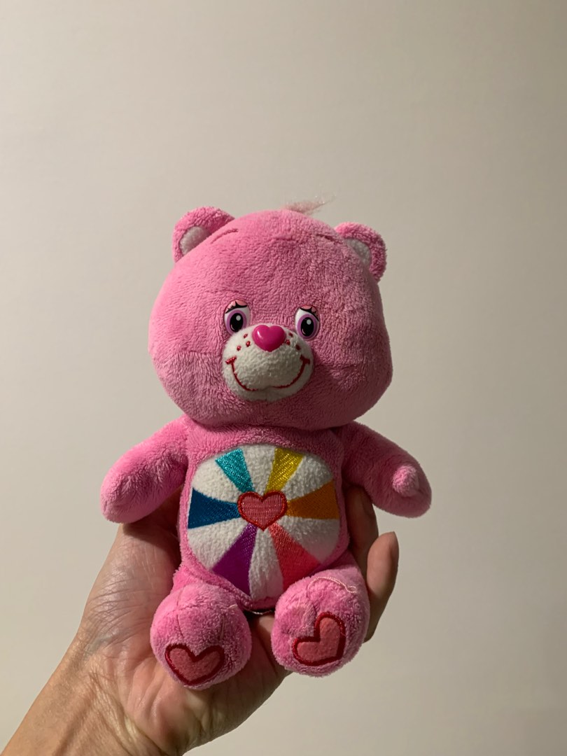 Pink care bear with 2 hearts discount