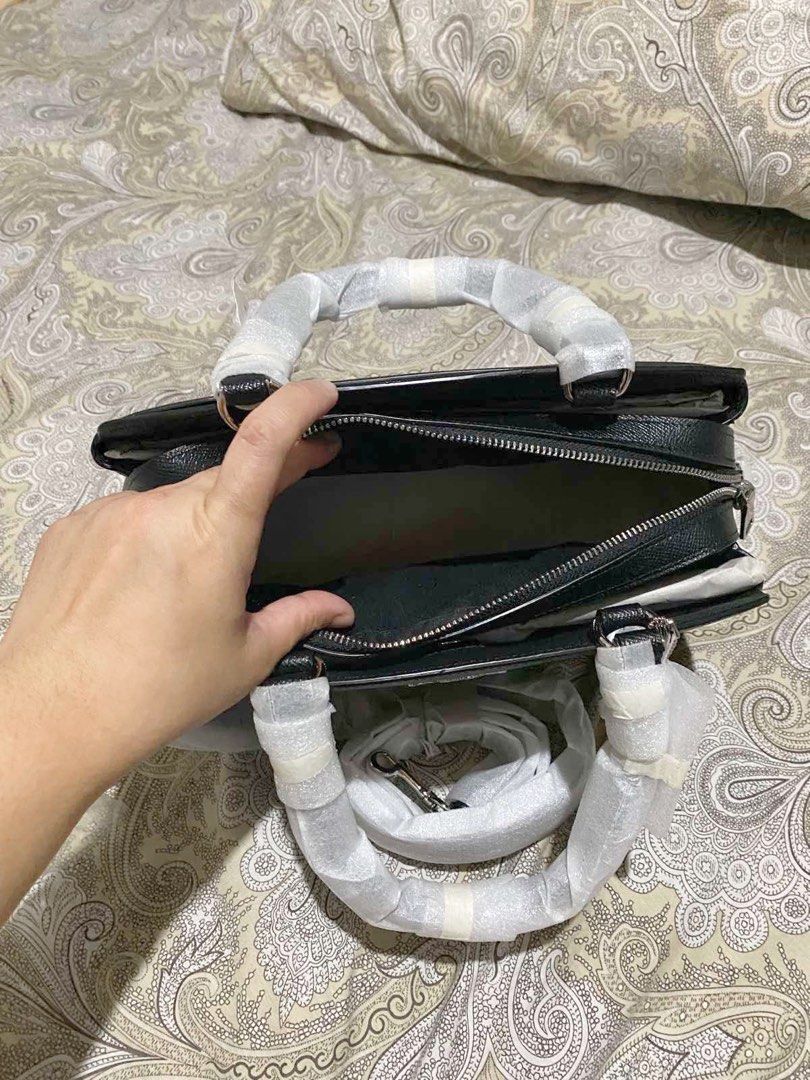 Coach Mini Lillie Carry All (Category: Shoulder Bags) located in Pasay City. Submitted by keepitluxe (Listing ID 1246690424, Image 3). Description: Details: • Crossgrain leather • Center zip compartment • Snap closure, fabric lining • Handles with 4 1/4” drop • Outside open pocket • Detachable strap with 21 1/2” drop for shoulder or crossbody wear • 10 1/4” (L) × 6 3/4” (H) × 4 1/4” (W) Bought in the US with tag $428 No box No paperbag ⚠️Strictly