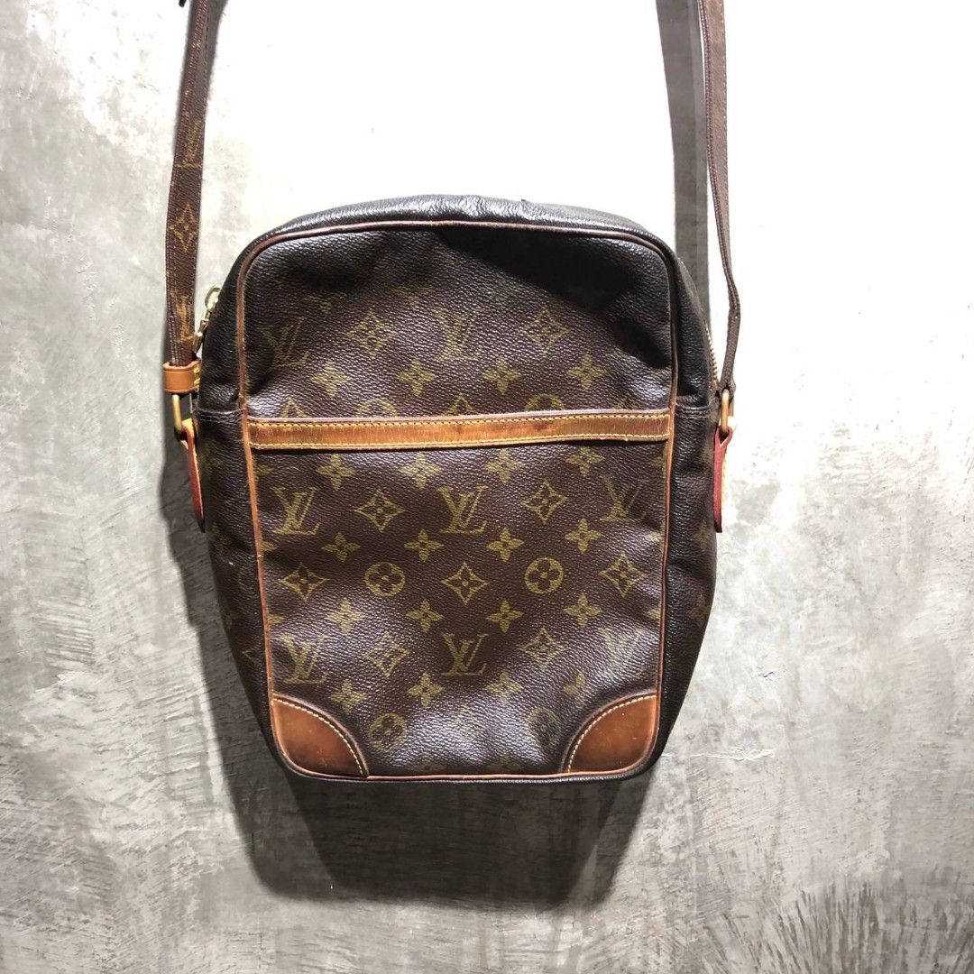 Louis Vuitton Danube Sling bag GM (Category: Luxury Bags & Wallets) located in Quezon City. Submitted by johnpaulperezzz (Listing ID 1246663215, Image 2). Description: Louis Vuitton Danube Sling bag size: GM dimension: Width: 8" Length: 11" Condition: 9/10 Issue: - Signs of usage light scuff on the vachetta leather at the lower part of the front and back of the bag retail: $1800 Price: 20k.