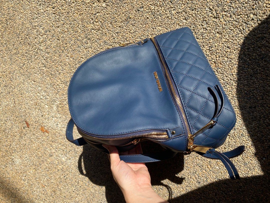 Michael kors blue leather backpack sales