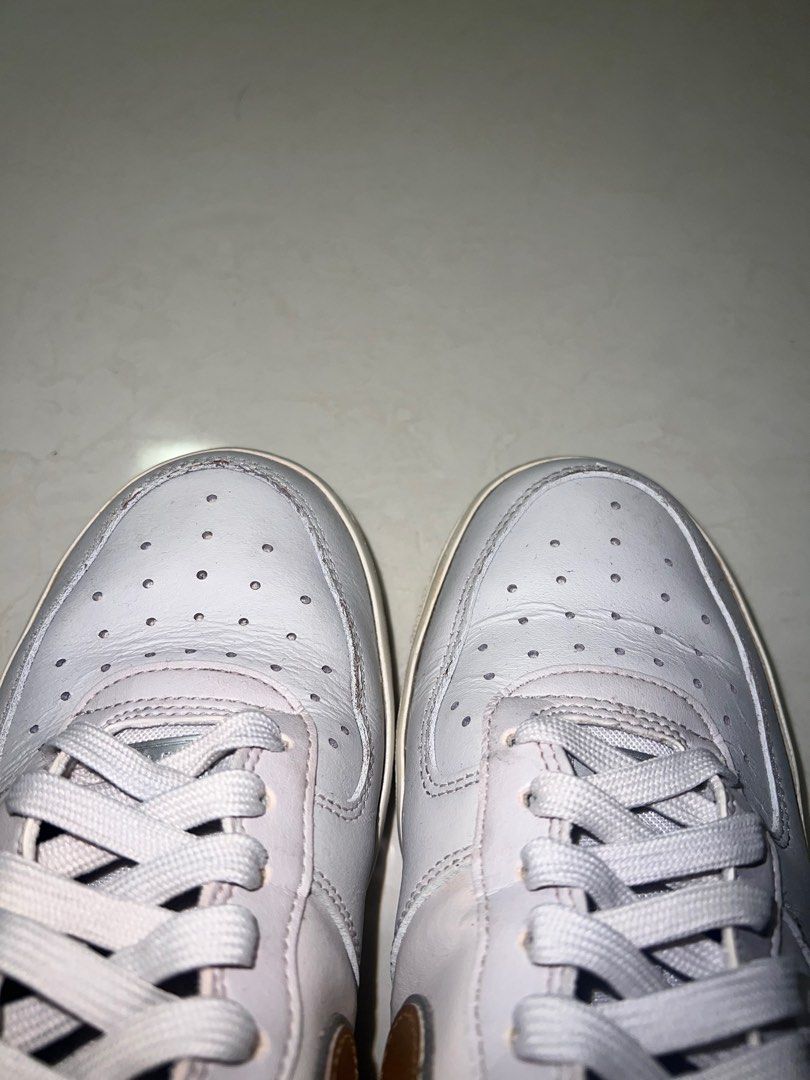 air force 1 with holographic nike sign