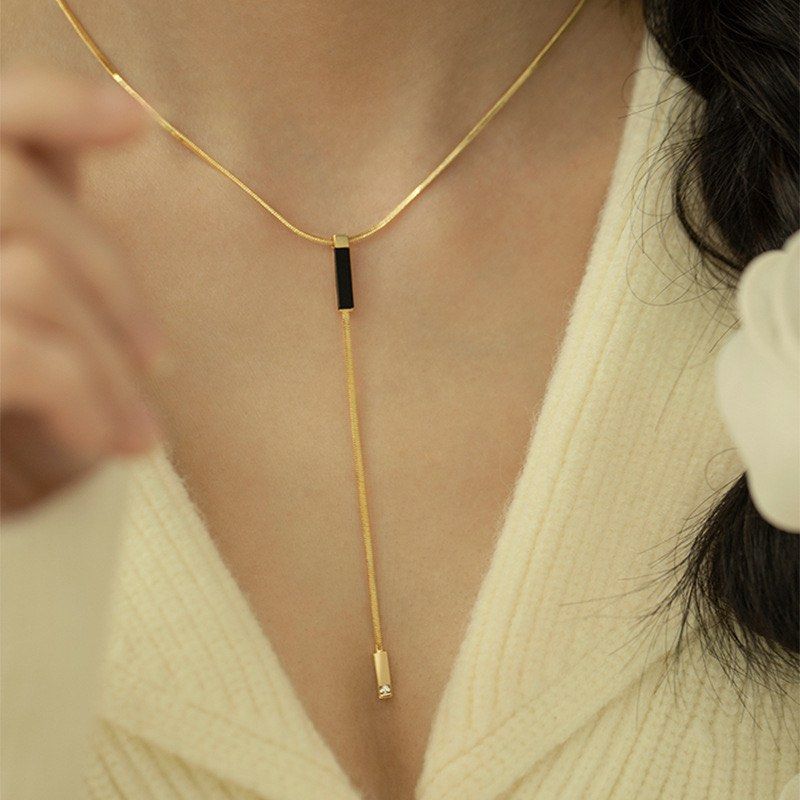 Gold tassel top necklace
