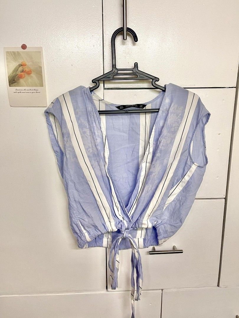 ZARA Light Blue Cropped Striped Sleeveless Top (Category: Sleeveless) located in Manila. Submitted by ar14na (Listing ID 1246714546, Image 1). Description: MOP: Gcash payment MOD: J&T or SCO! (shoppi chick out) Pretty paired with tube dresses under, however I'm selling this for cheap because of the visible bleach stains :< - Authentic Zara - Made in Turkey - First & second pics are mine! - See Issue Above EUR - S USA - S MEX - 26.