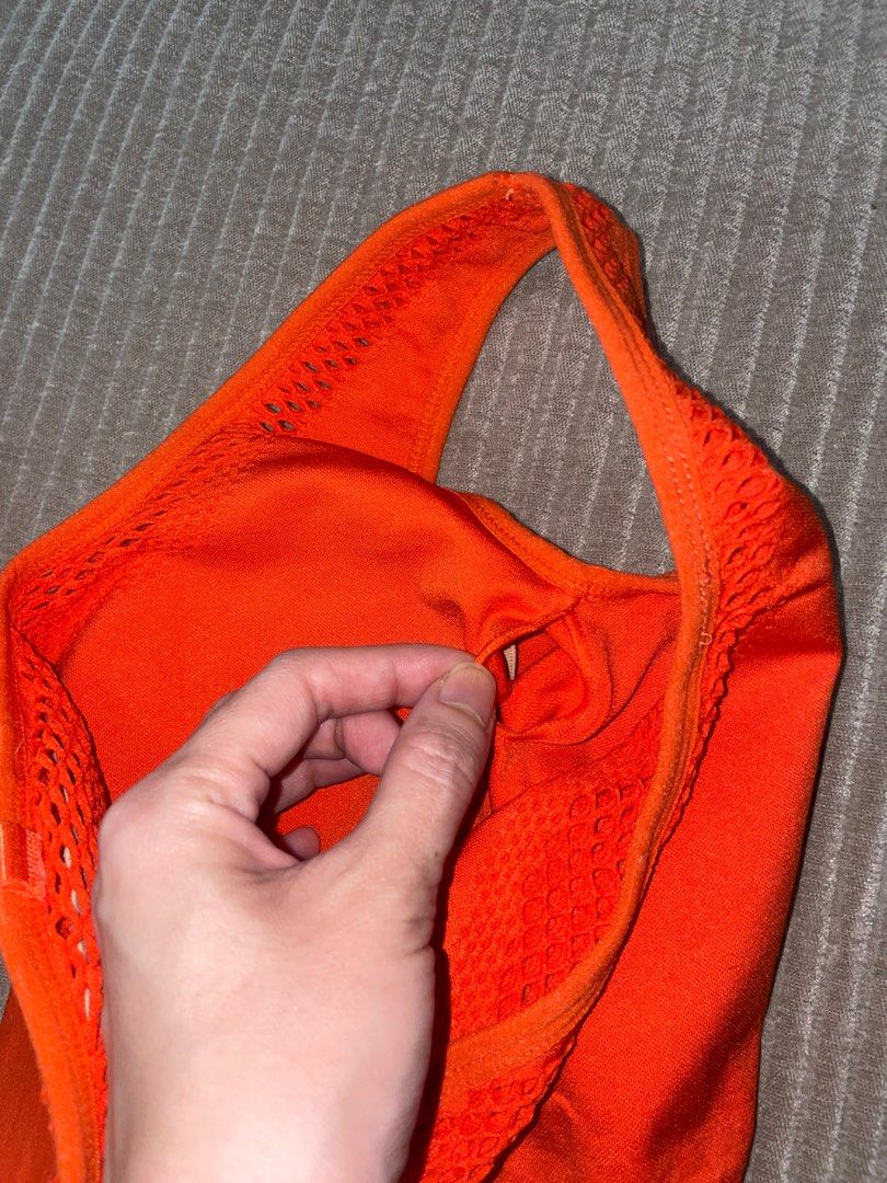 Bright orange workout set on Carousell