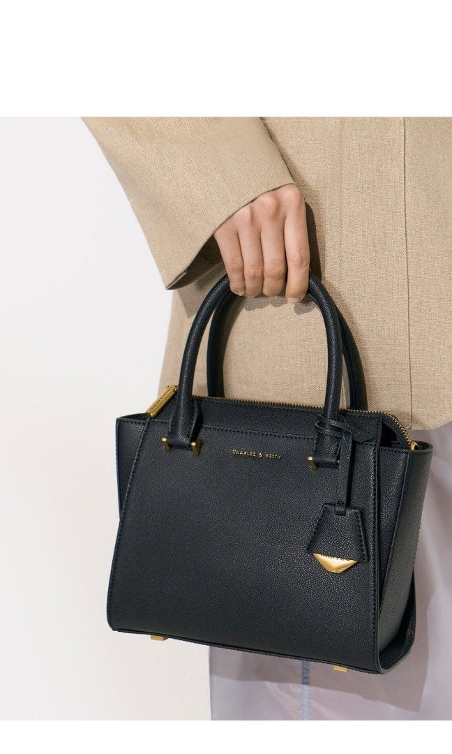 Trapeze charles and keith store