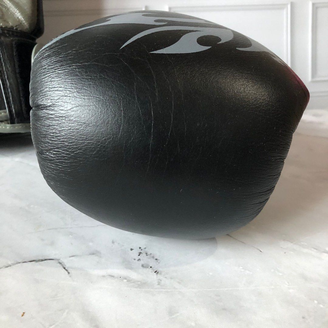 Evolve mma tribal boxing gloves 14 Oz on Carousell