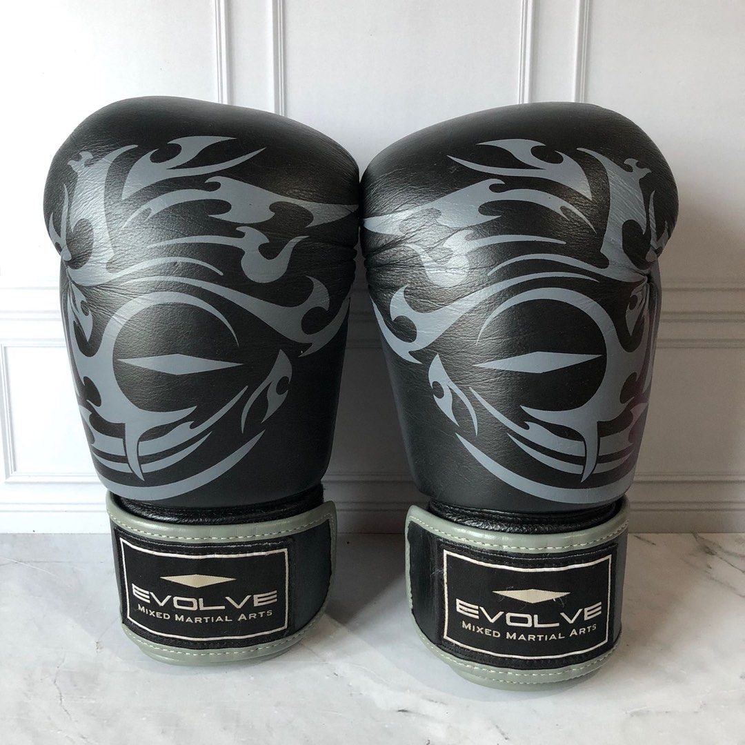 Evolve mma tribal boxing gloves 14 Oz on Carousell