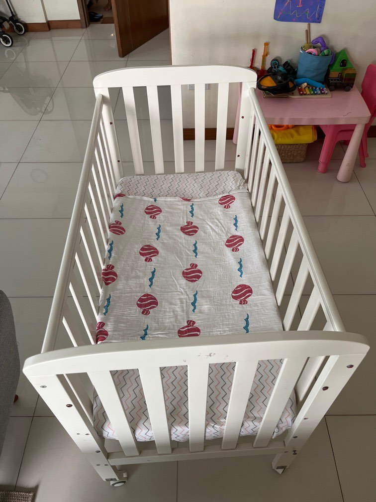 Good condition baby cot with free mattress, Babies & Kids, Baby Nursery