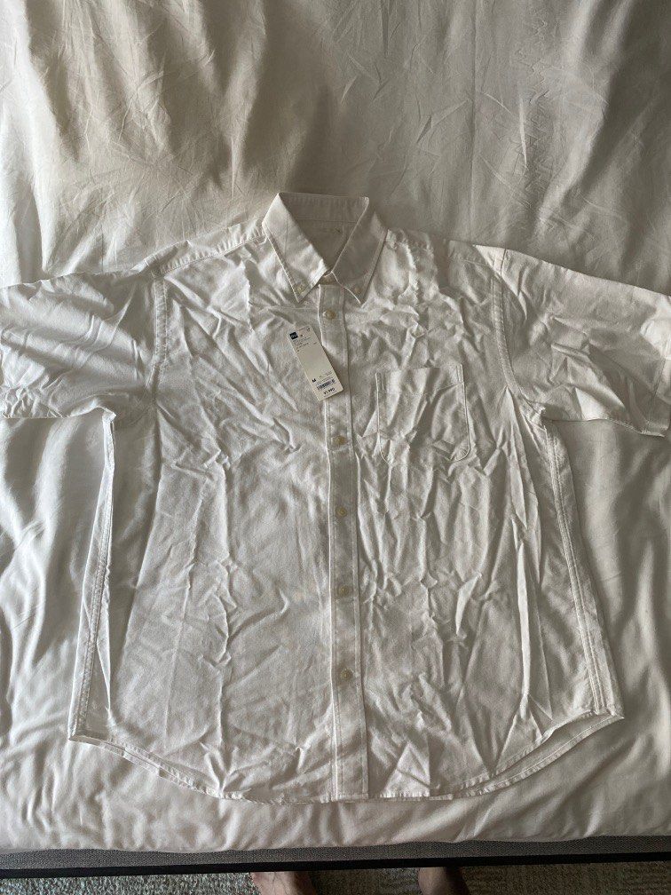 GU Men Polo Shirt (White) (Category: Tshirts & Polo Shirts ) located in Quezon City. Submitted by saaaandy (Listing ID 1250005484, Image 1). Description: GU Men Polo (White) Brand new Size: M (but oversized fits L-XL) L: 30in W: 22in Sleeves: 10in Price: P700 Payment: BPI or GCash only Delivery: shipping c/o buyer For inquiry: 09088805796.