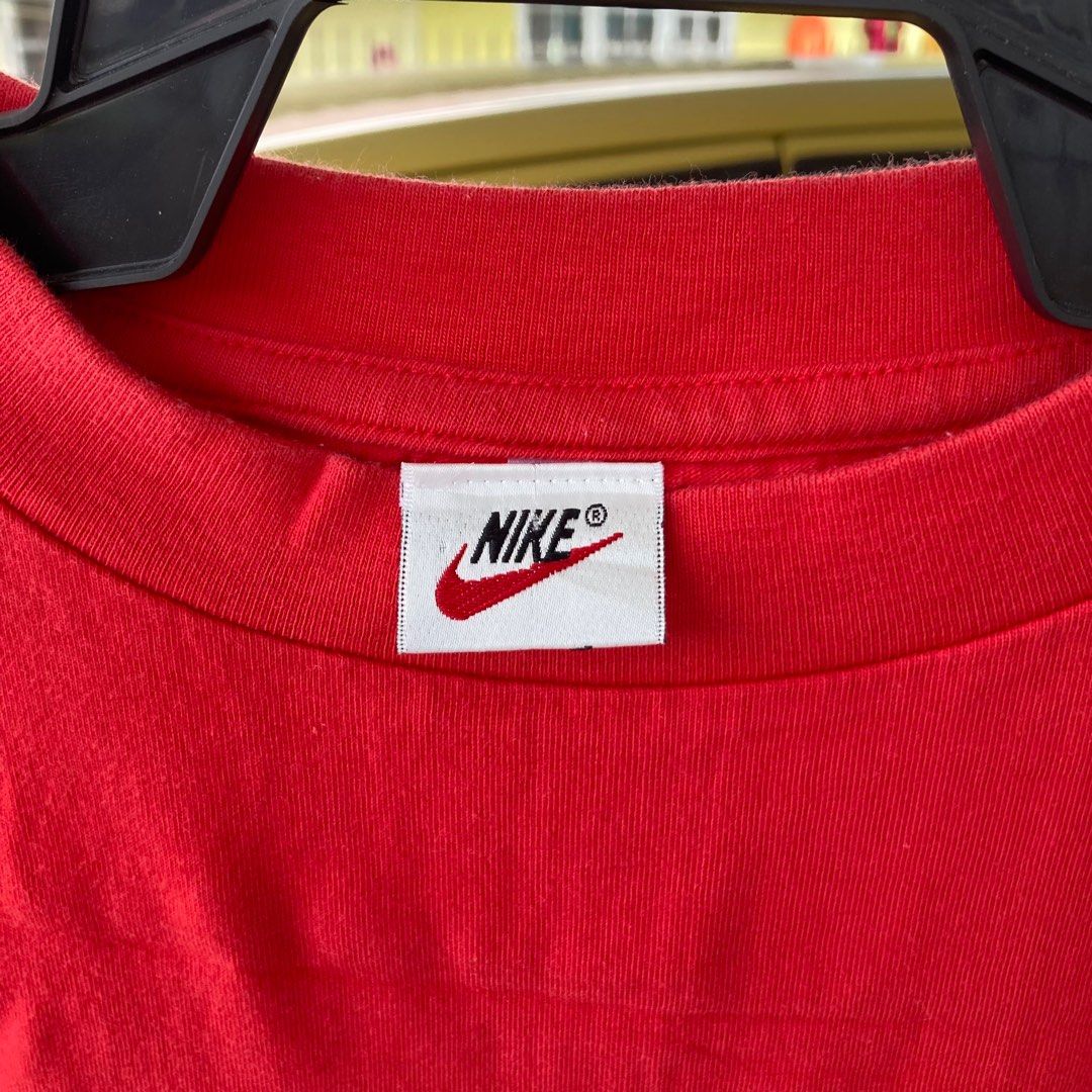 nike red swoosh tag